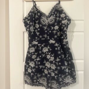 Altar’d State Navy and White Floral Romper Size Large